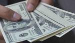 Espinoza asegura que el dólar seguirá bajando y que la tendencia está dentro de lo previsto